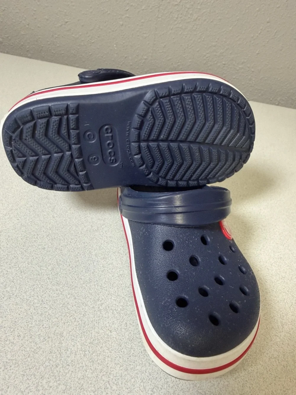 CROCS Kids Navy Clogs with White and Red Trim